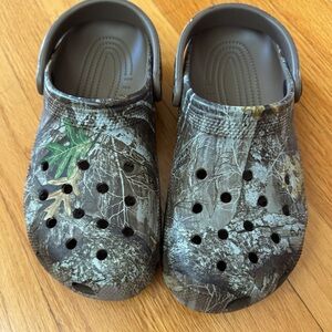 Unisex Camouflage Crocs. Women’s size 9. Men’s size 7.